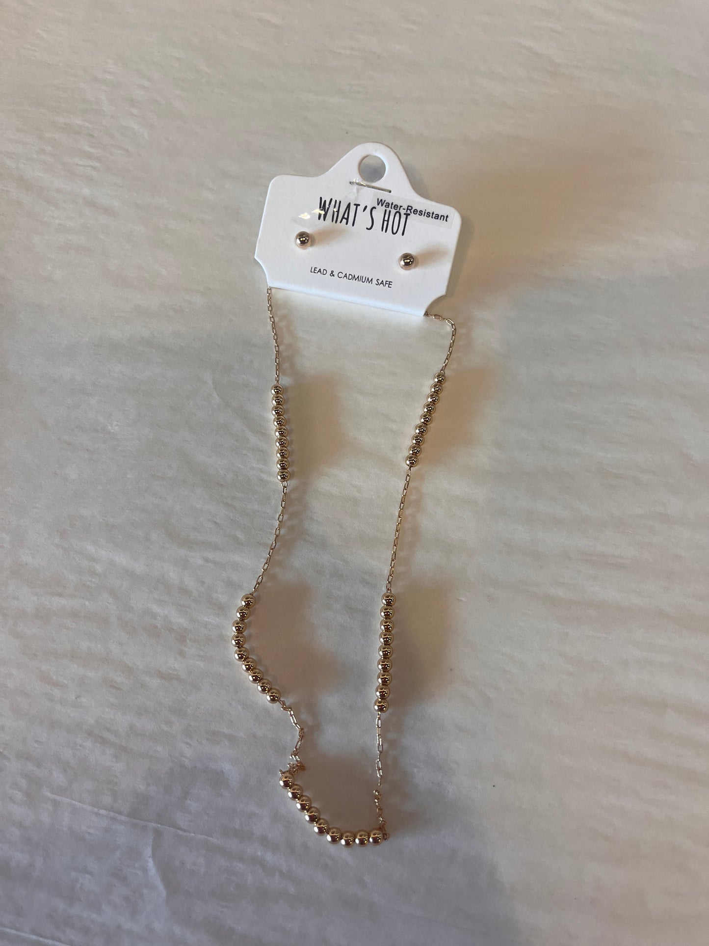 Gold bead grouped necklace
