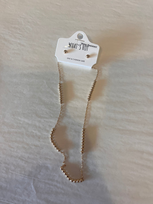Gold bead grouped necklace